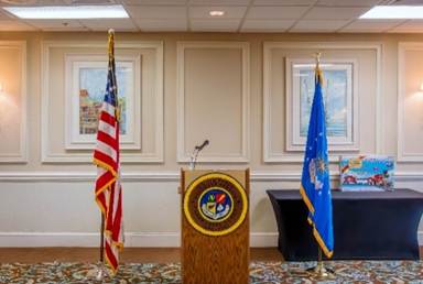 Flags on a podium in a room

AI-generated content may be incorrect.