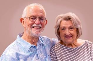 A person and person smiling for the camera

AI-generated content may be incorrect.